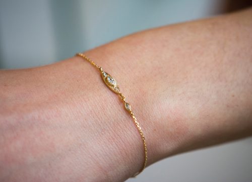 yellow gold protection and believes sun eye chain bracelet