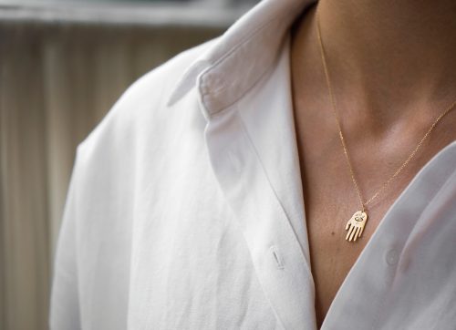 celine daoust protection believes small dharma's hand pendant