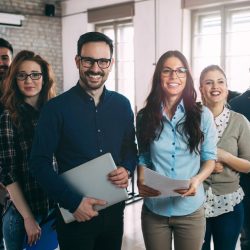 Successful company with happy employees in modern office