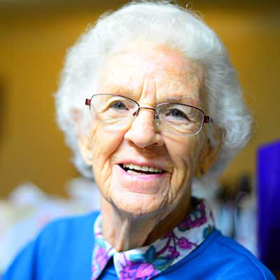 Photo of an older woman smiling