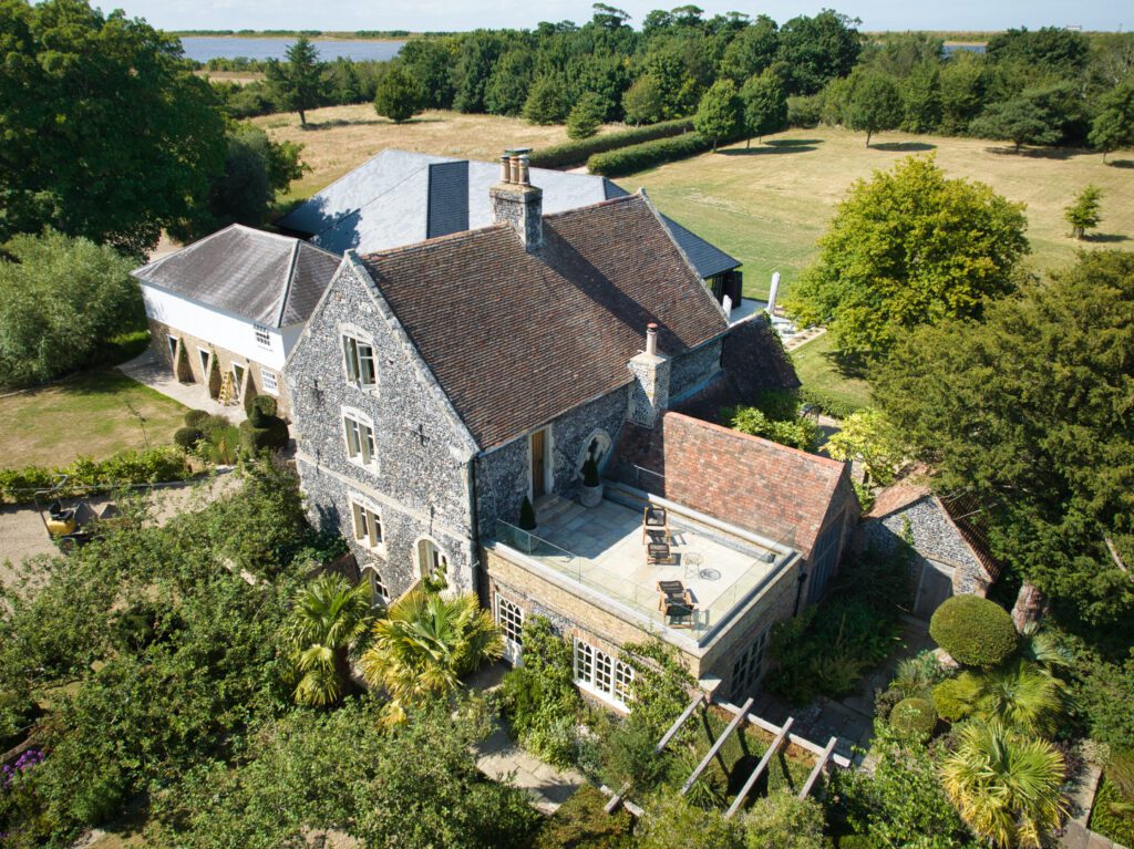 An ariel view of Chapel House Estate showing Chapel House, The Old Malt Granary and Thorne Barn