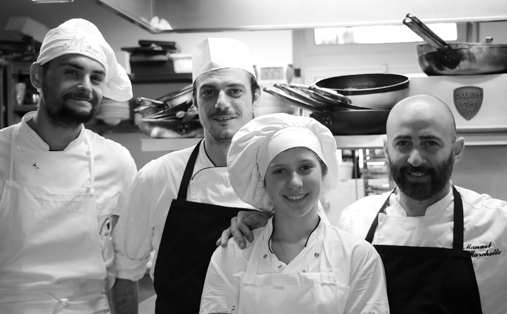 The Kitchen Chef Manuel (right) with his staff