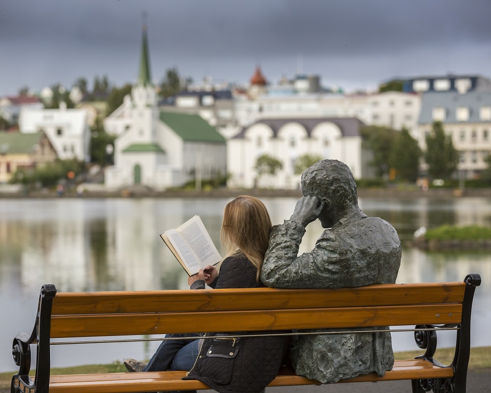 REYKJAVIK COL – Statue of Reykjavík poet Tómas Guðmundsson by the Reykjavík City Lake