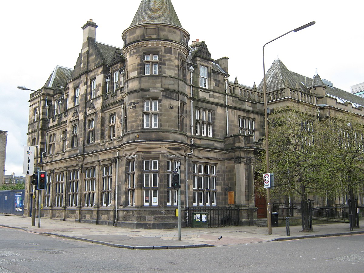 Photo of McDonald Road Library, looking at the round turret on corner of building