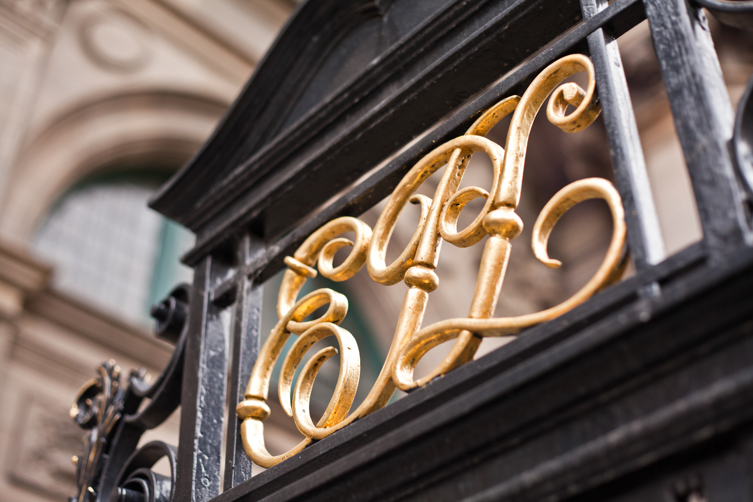 Close up of the gate of Central LIbrary: EPL in swirly gold letters