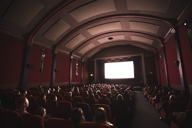 cinema theater people watching trailer