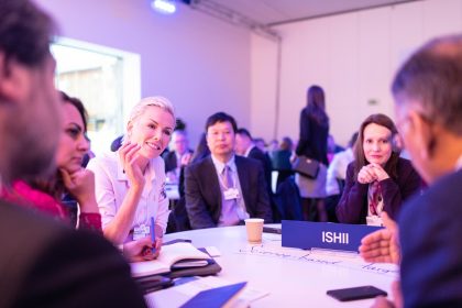 group of people networking at table