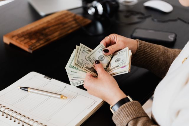 counting money at desk