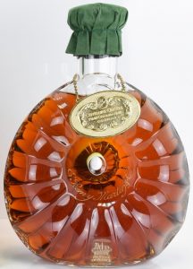 With a see through sticker stating content 70cl and ABV differently (ca 1989)