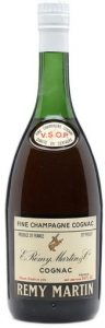 With Produce of France in top left, 70 proof in top right and 'not less than 24 fl. oz' in bottom right corner, with 'France' printed above it. Also: the fine drawing of the centaur on the neck label is in red rather than in black. (70cl, 1970s)