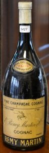 70 Proof stated; content not stated, called a large magnum at auction. Probably 3L.
