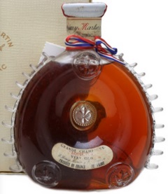 'Very Old' with 70 proof stated; 0.7L on the bottom and 24 FL OZ on the back of the neck; no number; white carton box (1962-63); there is a modern centaure on top of the capsule. UK market
