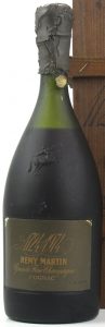 Just a number in the lower left; also no content stated on the back (click to see); said to be 70cl on auction. Same bottle on another auction was said to be 68cl (or 24 fl oz.)