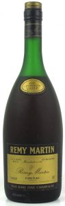 'Tres Rare Fine Champagne' on the lower end of the label; upper left: 1 US Quart, 94.6cl; below right 40% vol. upper right: Duty Free Sales Only. More yellow-gold label and Duty Free Sales Only starts to the right of '1724' below it.