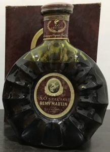 70cl (not stated) in dark green glass; XO Special is printed above Remy Martin. 1980s