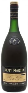1L bottle; '1Litre e' stated on the left below; 'F' stated on the upper left. The striped out part possibly has been 'duty free sales only'