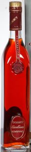 Red coloured labels and cap, 'Excellence' stated