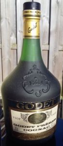 Underneat is stated 'Cognac Frankreich'; 40%vol on the right side and 70cl on the left; Godet Frères is printed very wide