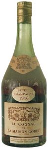 1916 Petite Champagne, with an addititional label with importer data (b. 1950s)