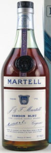 Capped cork, no riveting; 24 FL OZS, produce of France, 70 Proof stated (1960s); text in French