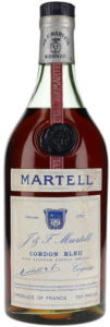 Capped cork, no riveting; 24 FL OZS, 70 Proof stated (1960s) 