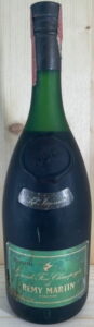 With a green label (the colour seems to be a discolouration)