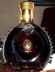 With a tidyman glass and a recycling symbol; 70cl and 40%vol on first line