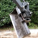 CompactTilt CT1 hydraulisch kantelstuk gemonteerd op graafmachine