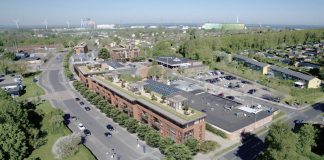 Gammel projekt med boliger ved butikscenter er igen på dagsordenen Der gøres endnu et forsøg på at bygge boliger ved Munkebo Bycenter. Illustration: Sunke Arkitekter.