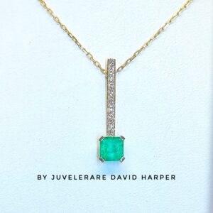 Emerald and diamond pendant.