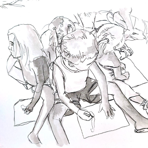 Pen and ink drawing of kids drawing on paper