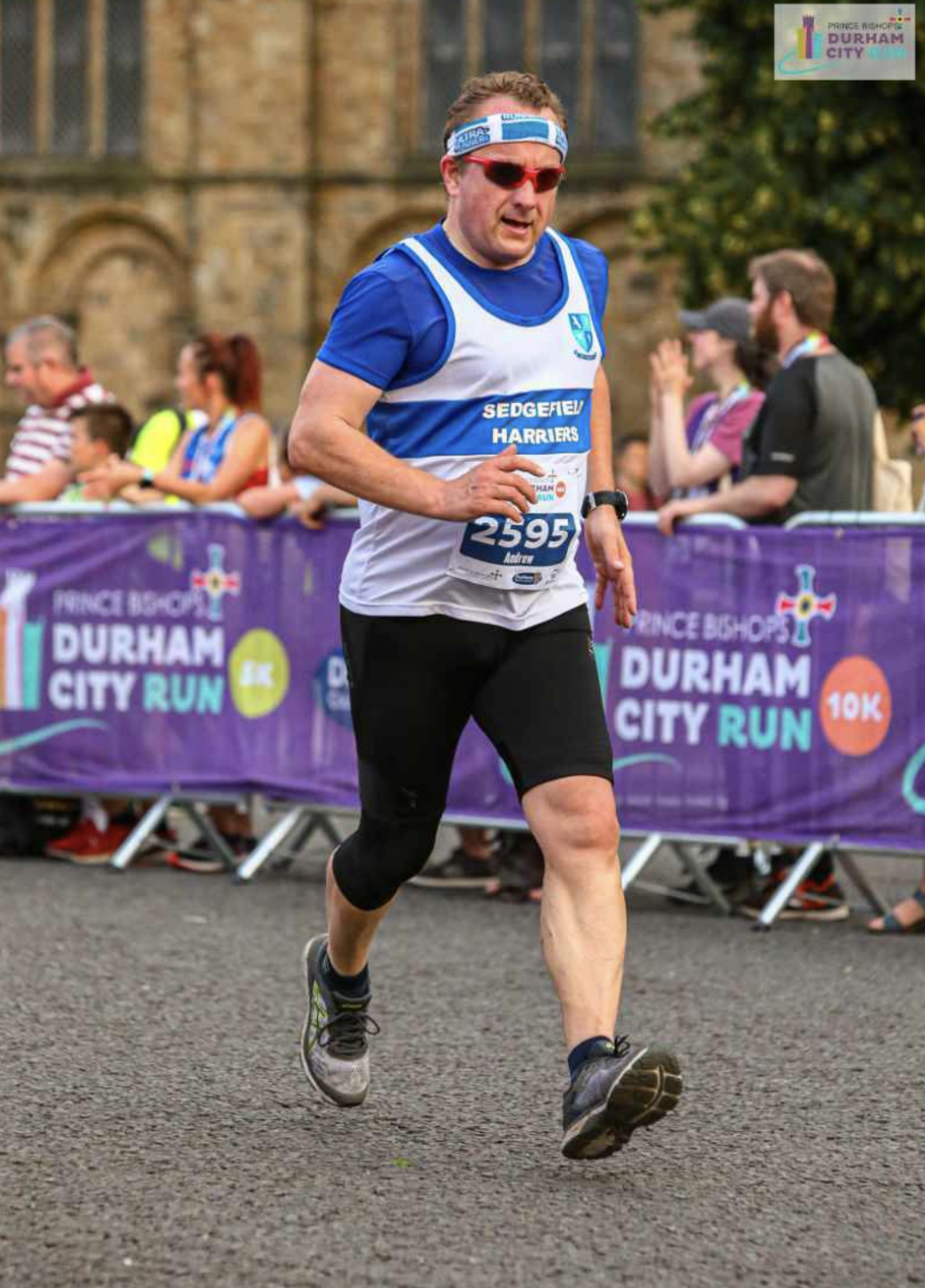 Full body picture of runner at Durham City Run 10k.