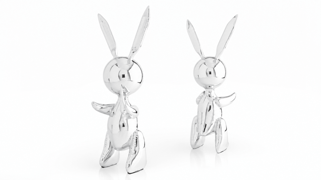 Two Balloon Rabbit XL sculptures in Silver, side by side