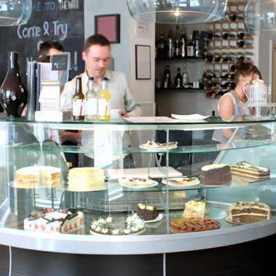 Matt Bancroft, owner of The Walk Café behind the counter