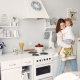 mother cooking with little daughter