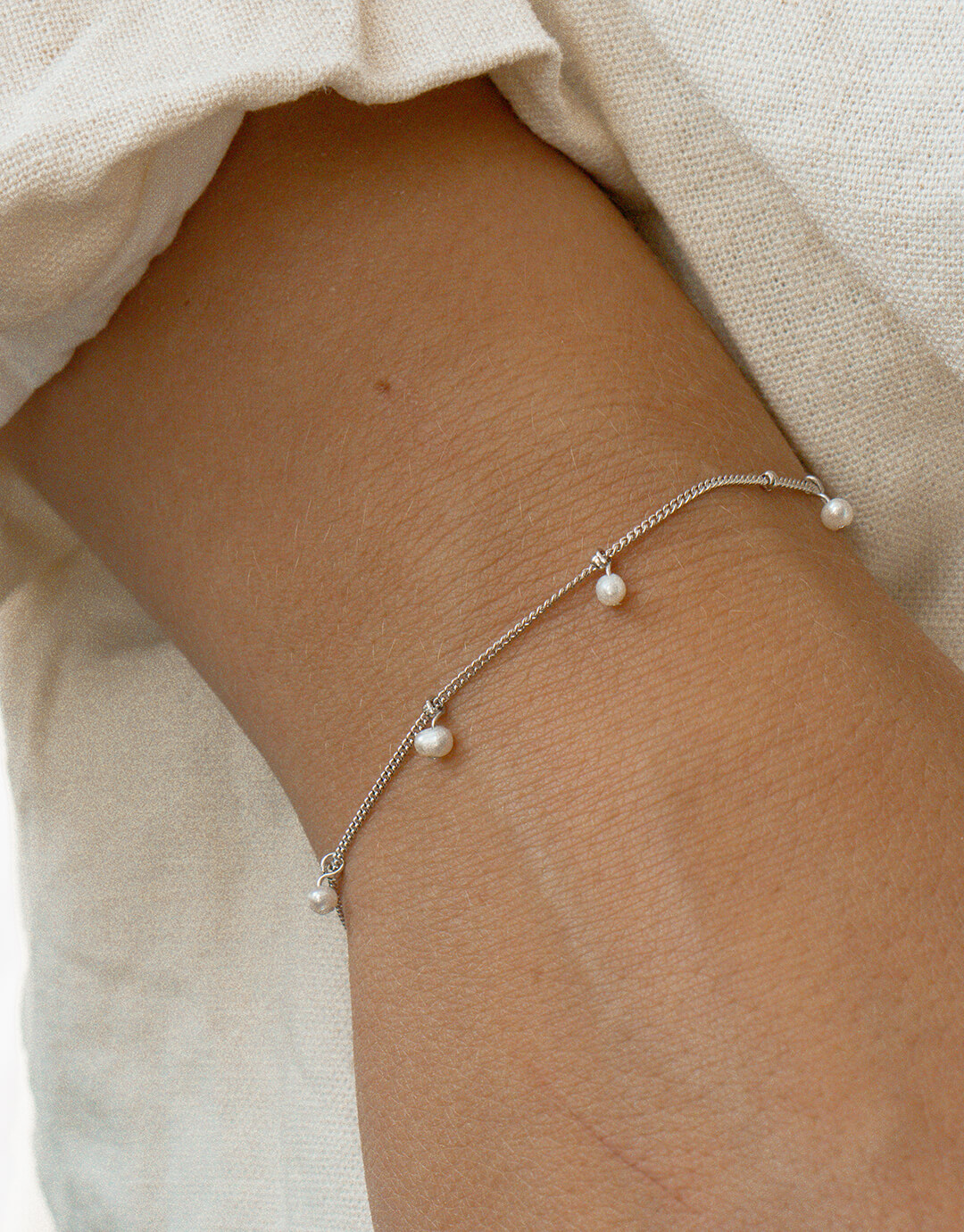 sølv armbånd med perler