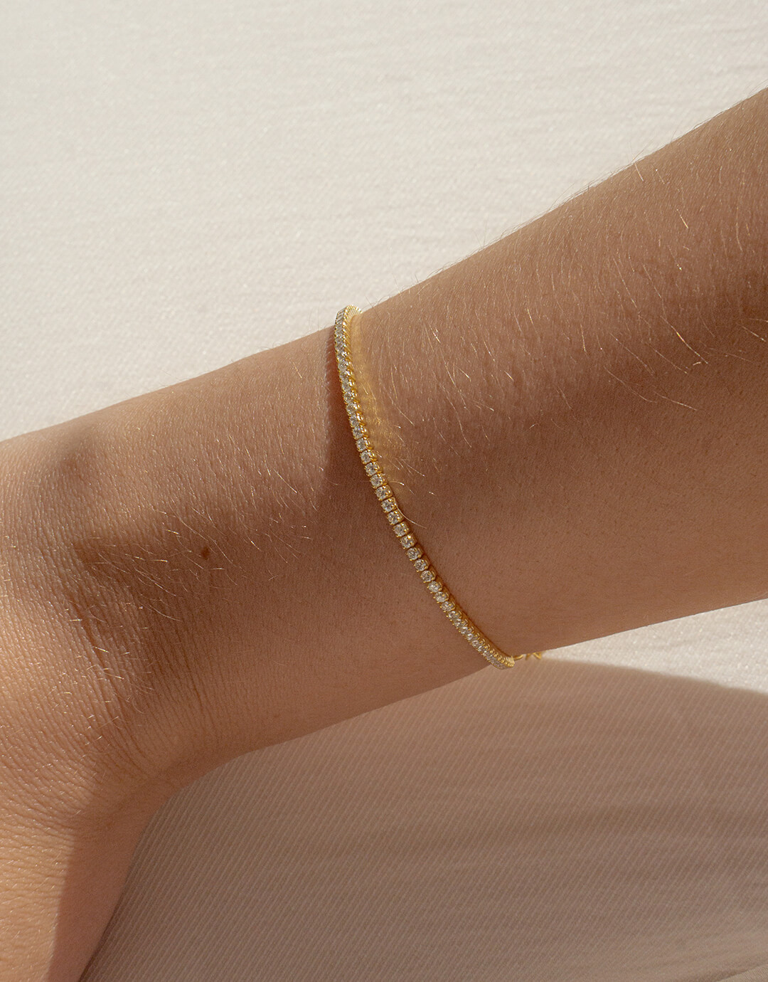 Tyndt tennis armbånd