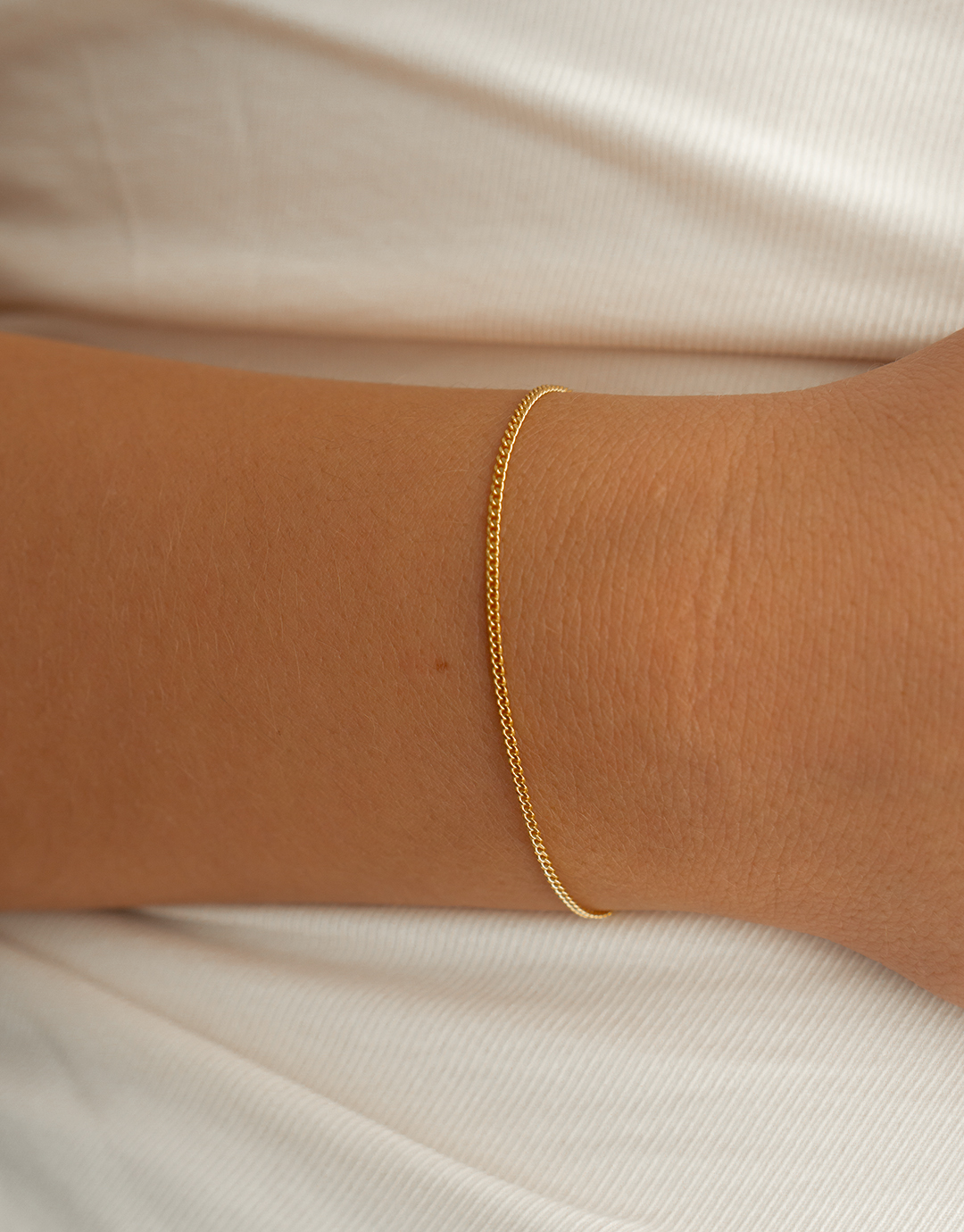 Sia - Guld armbånd