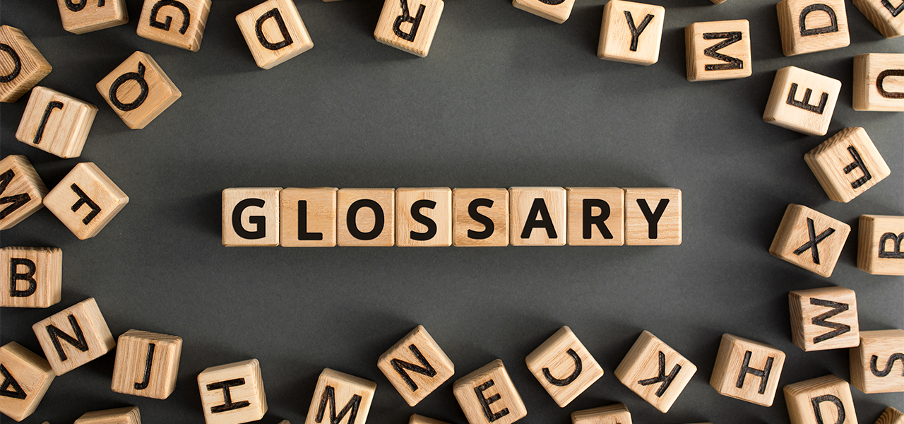 Holzwürfel mit Buchstaben Glossary