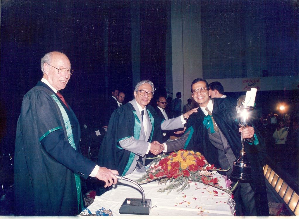 Graduation ceremony, Dr Ahmad Khalil receiving his honours from the legendary best known dean of Qasr Elaini Faculty of Medicine, Professor Hashem Fouad, and to his right Professor Hashim Moro