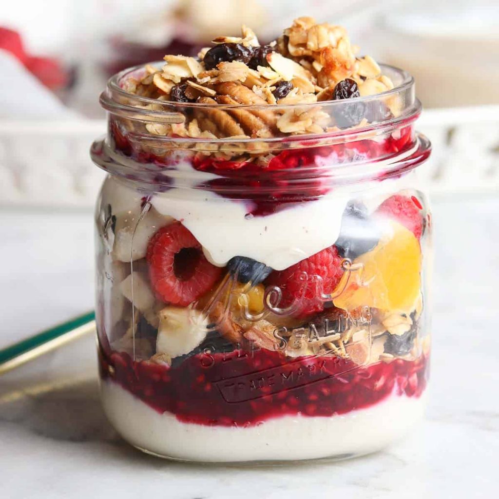 Yogurt Parfait: In a jar or glass, layer Greek yogurt, sliced strawberries, and granola.