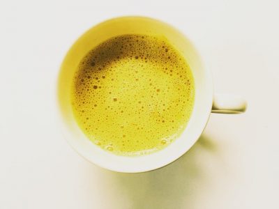 Golden Turmeric Latte on a white background