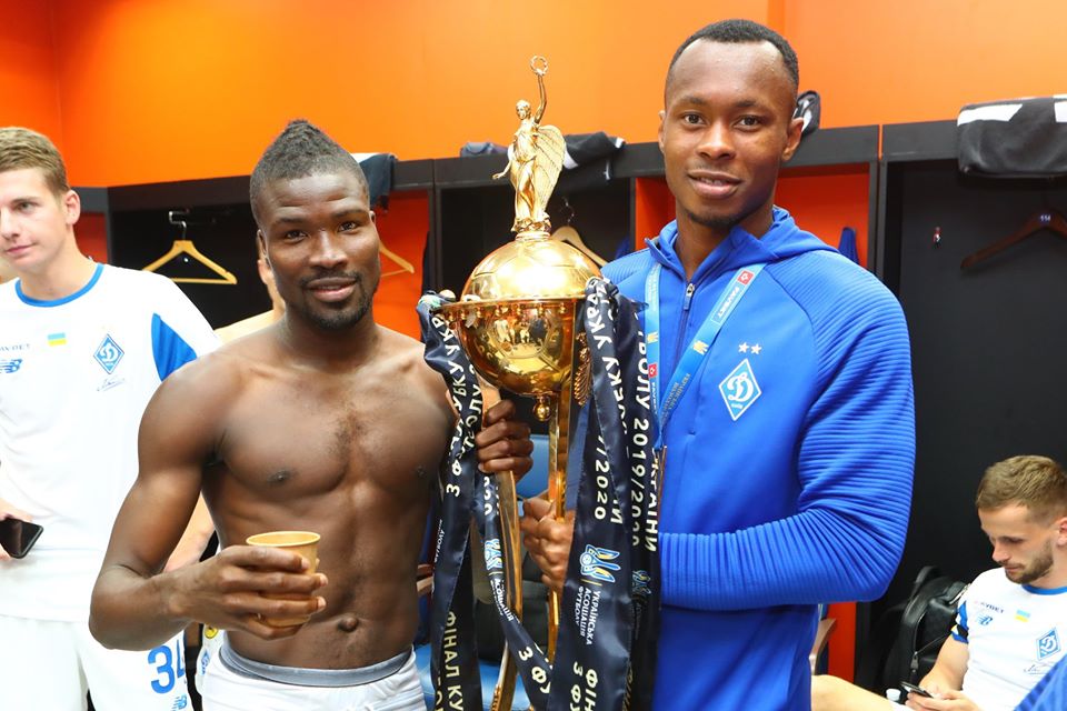 Kargbo and teammate with Cup