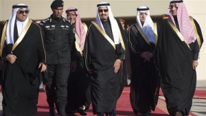 Saudi King Salman (C), Crown Prince Moqren bin Abdul Aziz (3L), and Interior Minister Mohammed bin Nayef (L) walk at King Khalid International Airport in Riyadh on Jan. 27, 2015. (Photo by AFP)