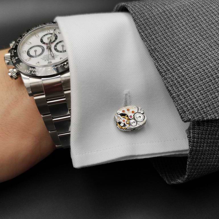 manschettknappar likt urverk