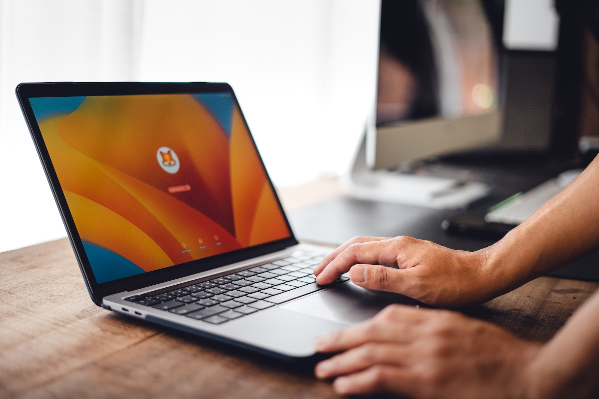 Close up of businessman working and login on laptop