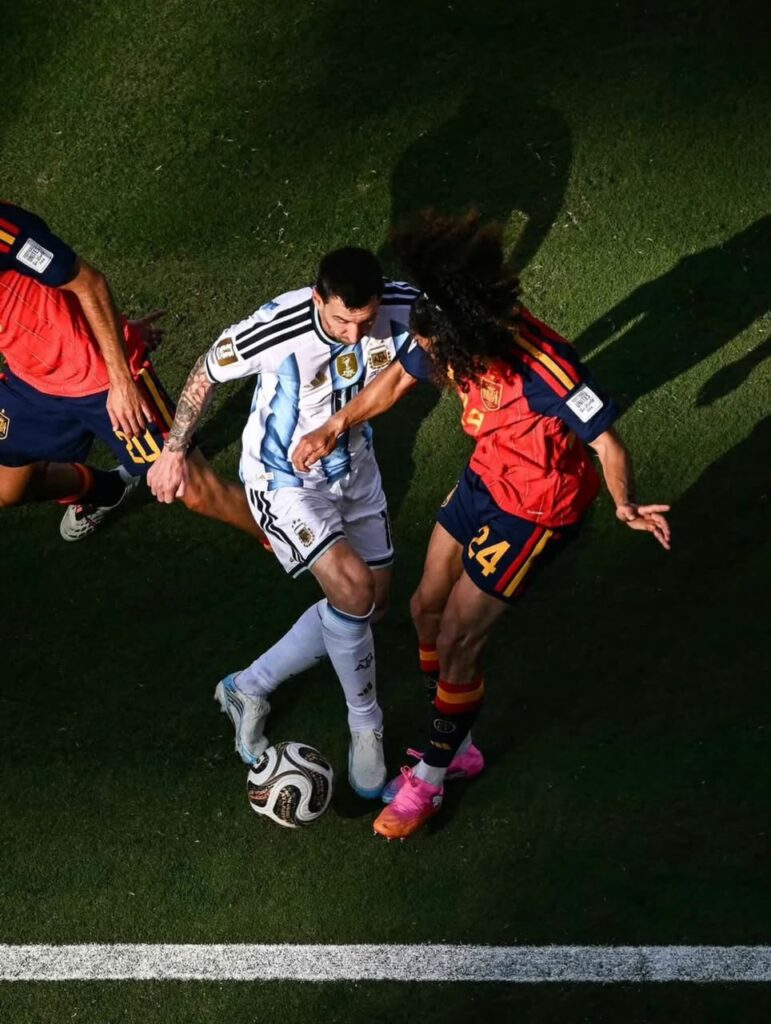 Messi and A footballer from Spain