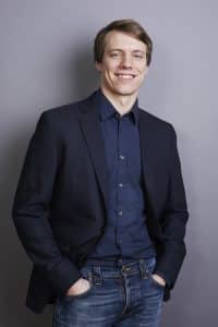 Yannick Jacob in a suit and tie