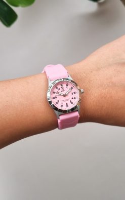 pink childrens watch from gul watches on ladys arm