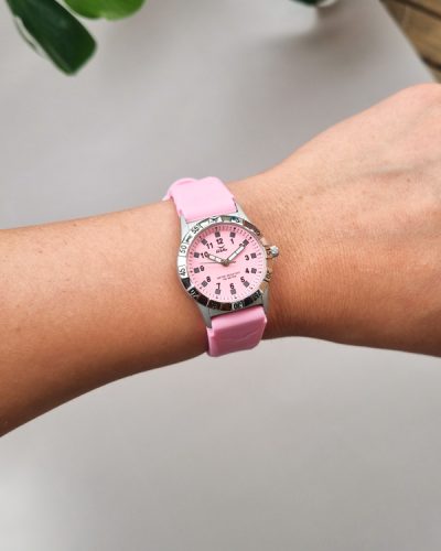 pink childrens watch from gul watches on ladys arm